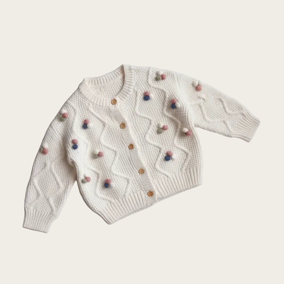 Floral Embroidered Cardigan cream flat lay warm background